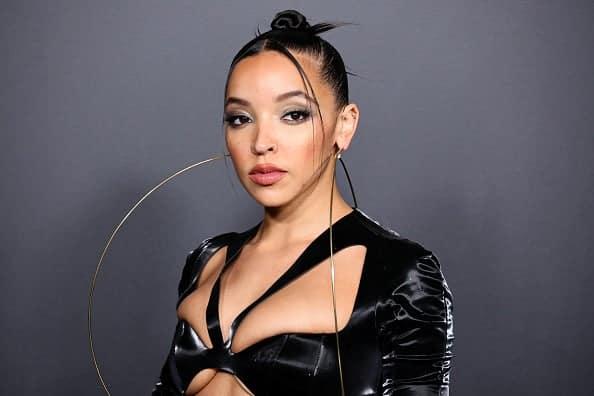 Tinashe Shows Off Toned Abs + Poses Topless, Crowns Herself 'Man Of The Year'