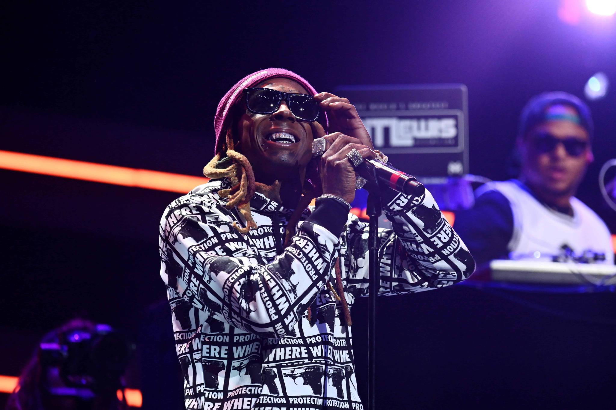 Lil Wayne Put A Crowd In Check After Someone Tossed A Blue Bandana At Him