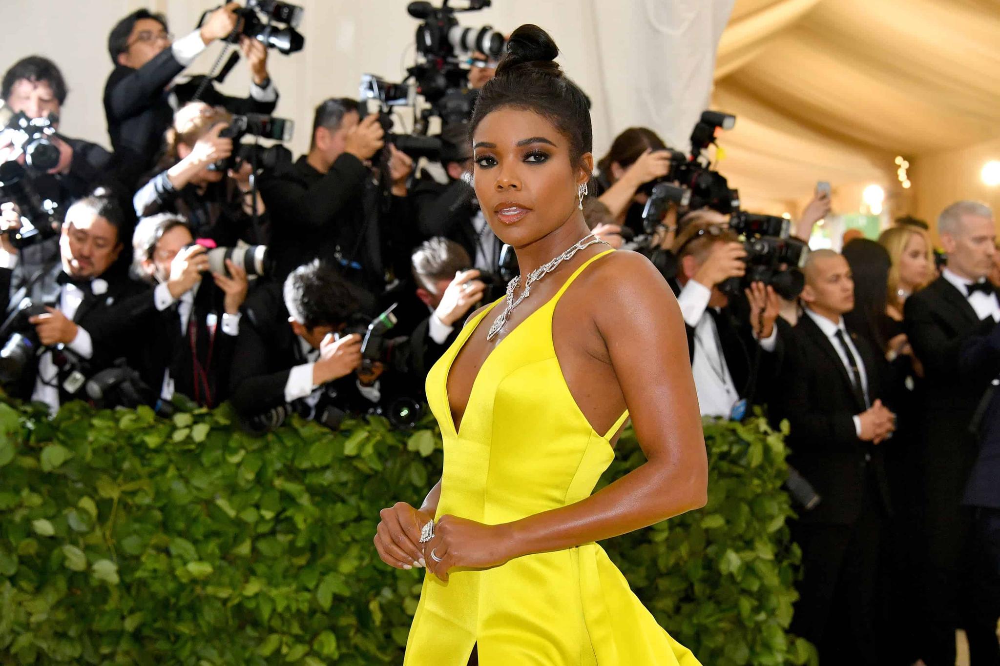 Gabrielle Union Breaks The Internet In A Green Cutout Dress + Pays Homage To Beyoncè